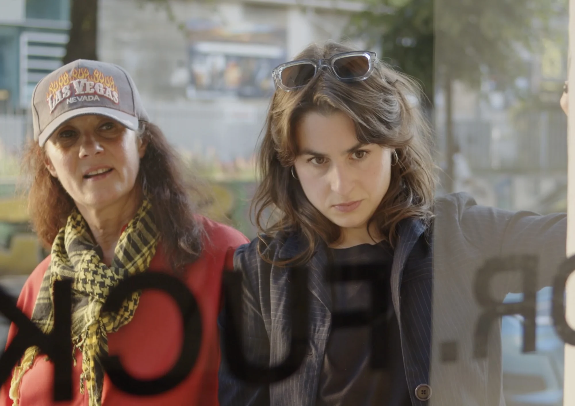 Two women in a scene from How Did I Get Here